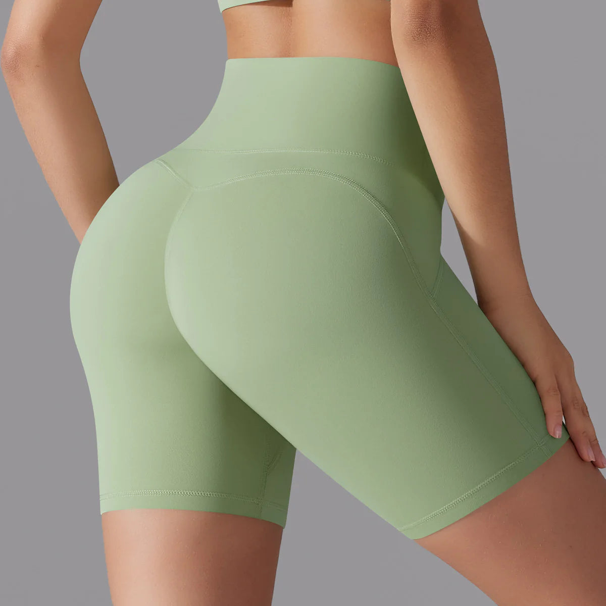 Shorts de yoga verdes Senselle con soporte y elasticidad que acompañan cada movimiento.