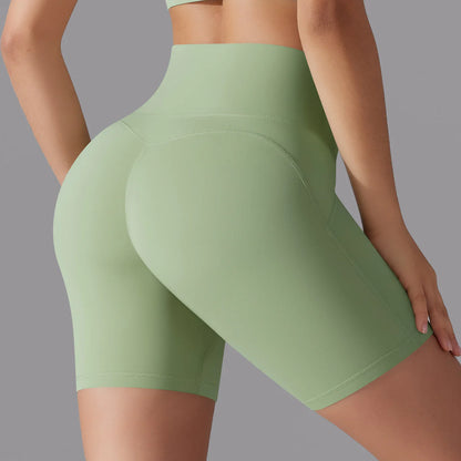 Shorts de yoga verdes Senselle con soporte y elasticidad que acompañan cada movimiento.